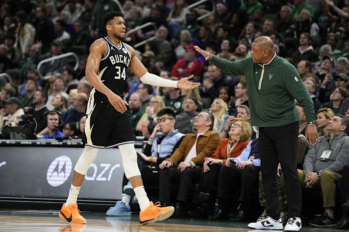 ; Milwaukee Bucks forward Giannis Antetokounmpo (34) is greeted by head coach Doc Rivers 